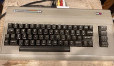 Commodore 64 Computer With Power Supply - Powers On. Disk Drive Untested.