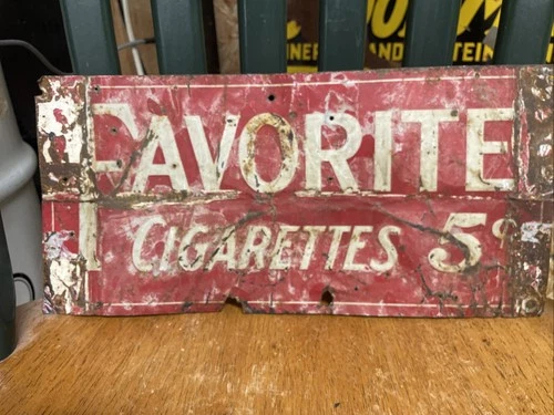 Vintage "Favorite Cigarettes" 5¢ advertising tin sign. 14”x7” Rare!!