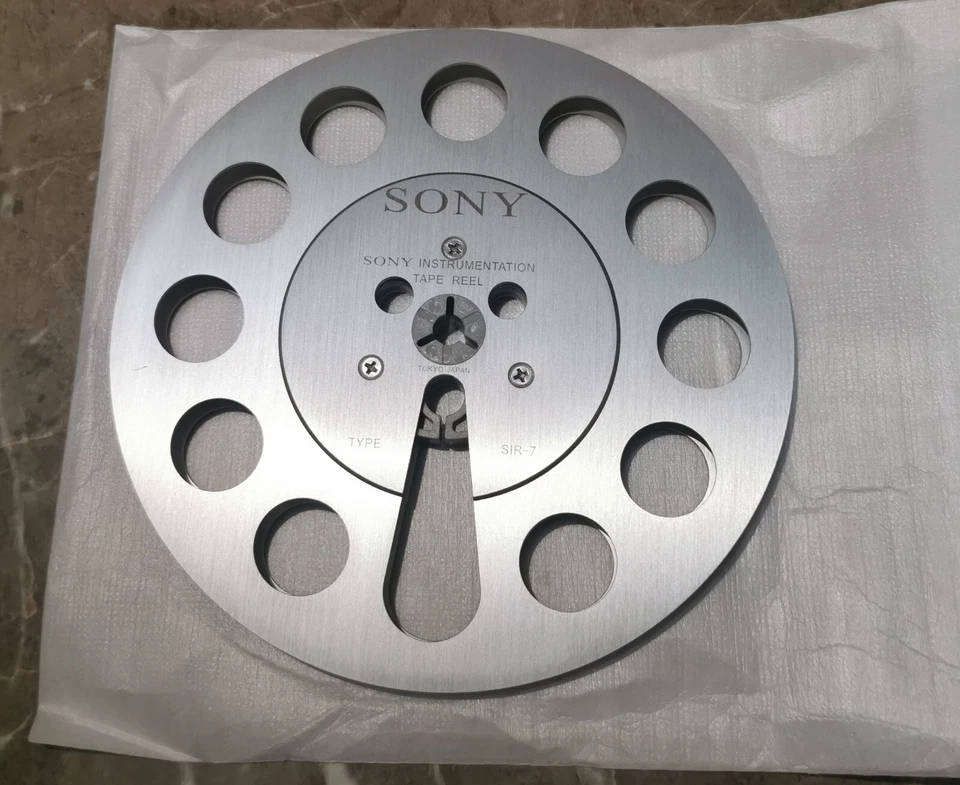 Un par de carretes de cinta plateados Sony 7" pulgadas metal claro aluminio carrete de recogida Foto 3 de 3