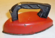 vintage Childrens Wolverine red toy iron Black Handle rusty rough shape Metal