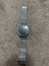 Skagen Mens Watch Silver Stainless Steel Mesh Band Black Dial needs batteries