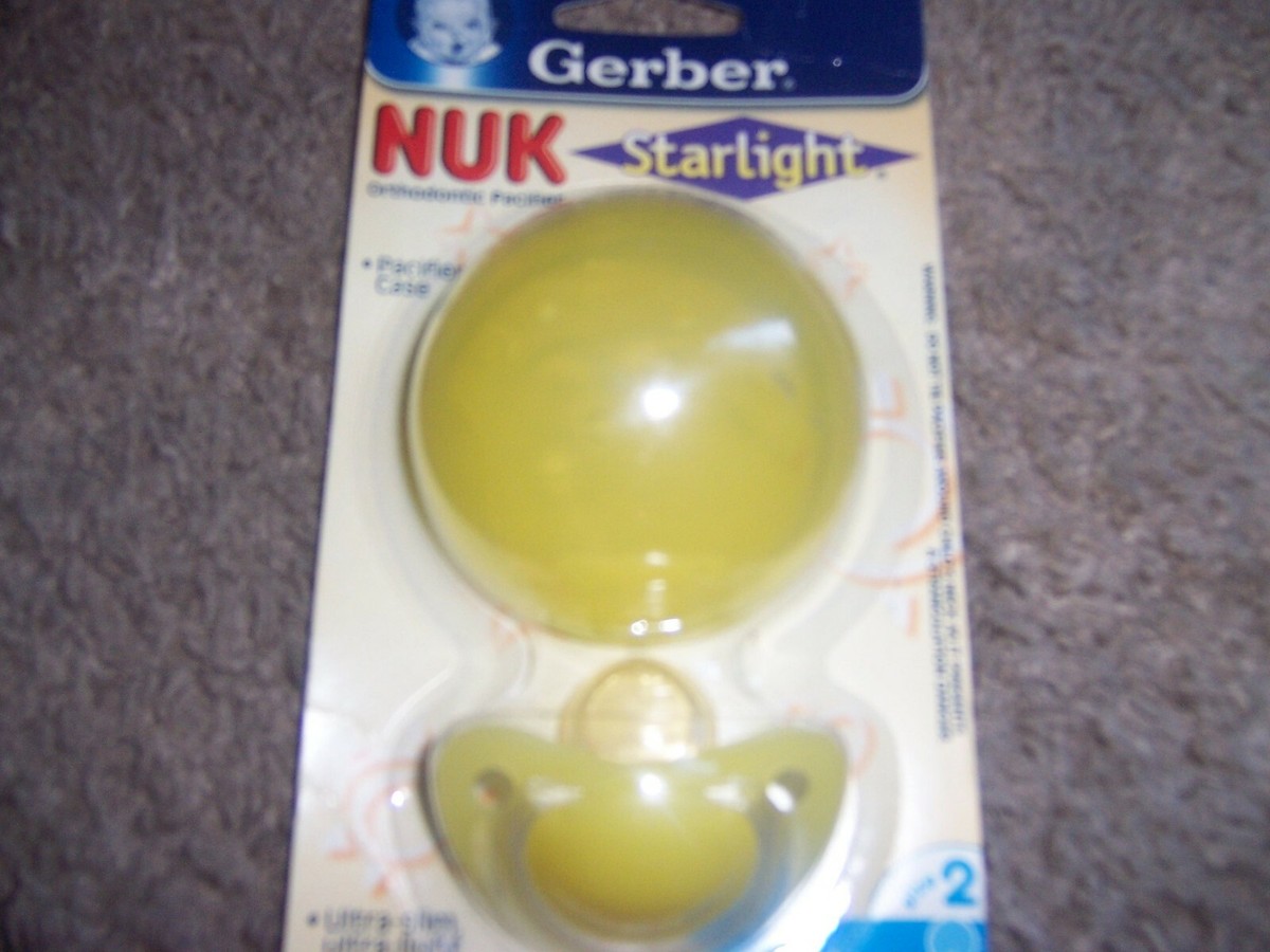 Gerber NUK starlight sitter pacifier size two yellow