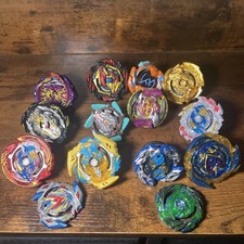 LOT of 12 BEYBLADE Burst Tomy