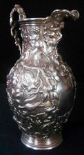 A large solid silver hand-chased pitcher,  Tiffany & Co., New York c.1852-62.