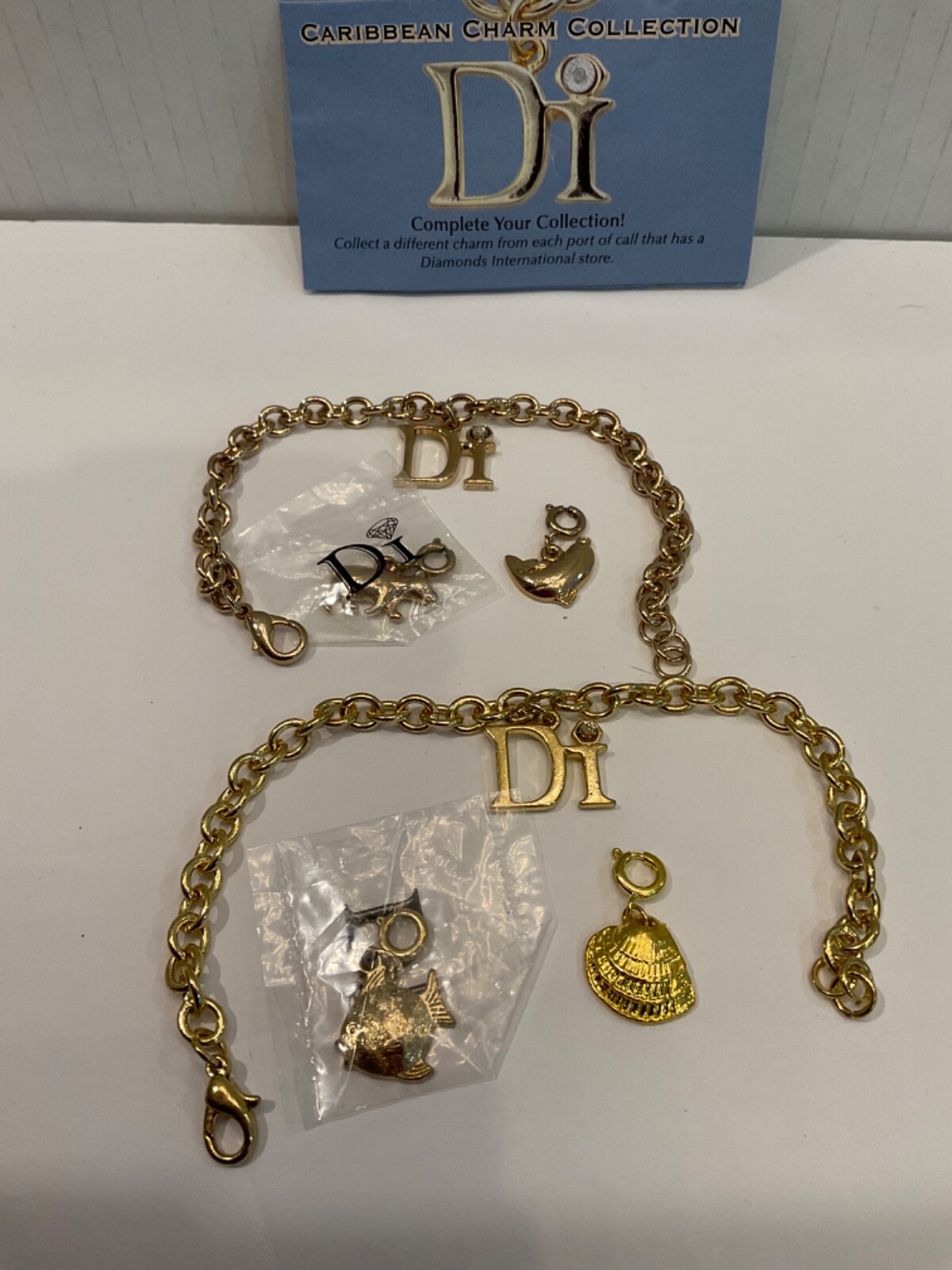 Set of Two DIAMONDS INTERNATIONAL CHARM BRACELET WITH 4 Charms eBay