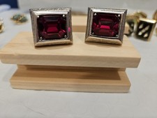 Swank vintage cuff links with dark red stones in a silver setting