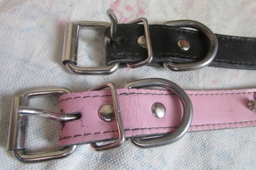 A LOT OF 2 BLACK & PINK LEATHER NECK COLLARS STUDS & SPIKES  TOTAL LENGTH 15.5”