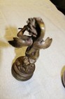 Vintage Brass 7.5" Flute Player with Swan on his back & head of swan on his head — photo 6