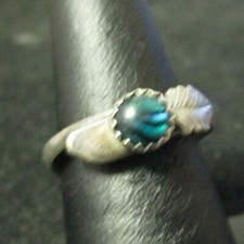 sliver ring size 6 with a green stone