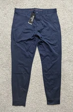 rhone commuter pants Cuffed ankle with zipper opening stretch Mens Sz 32 Blue
