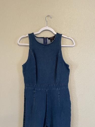 Tuta denim nero pomodoro geloso taglia S jeans svasata girocollo cerniera - Foto 2 di 13
