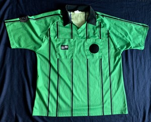 green referee shirt