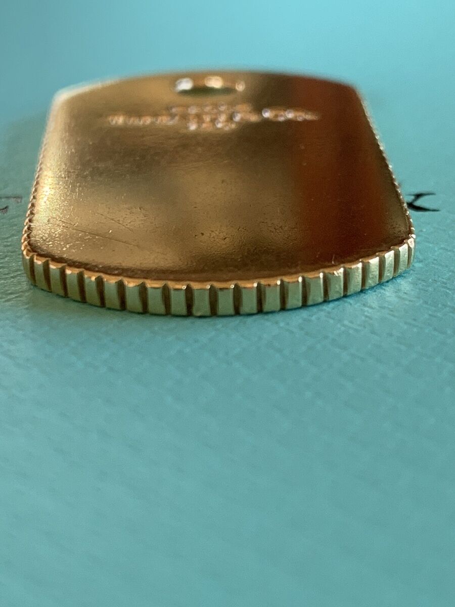 Tiffany & Co 18K Gold Coin Edge Dog ID Tag Pendant Tiffany & Co 18K Gold Coin Edge Dog ID Tag Pendant