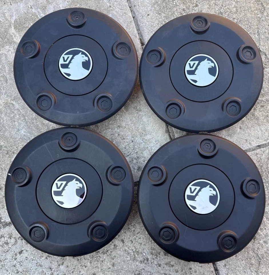 VAUXHALL VIVARO ALEACIÓN RUEDA CENTRO TAZA BUJE NEGRO PLATA PIEZAS ORIGINALES 9833710377 Foto 2 de 4