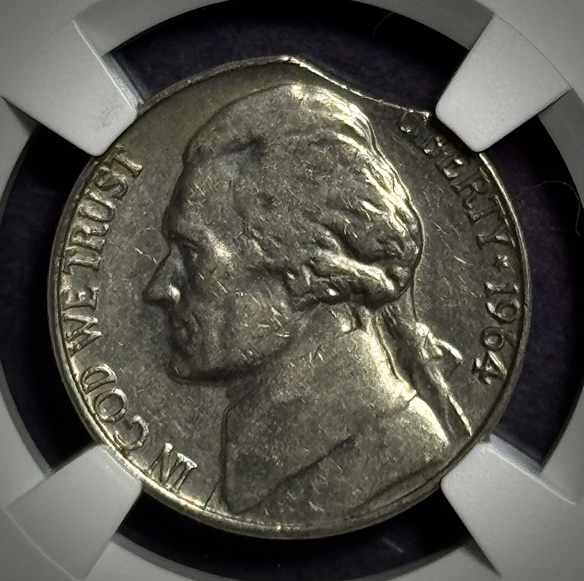1964 Jefferson Nickel NGC “Mint Error” UNC– Clipped Planchet