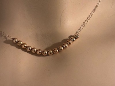 adorable 14k solid yellow, gold add a bead necklace