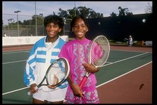 Venus Williams stands with fellow tennis player Zinc Gerrison Old Photo