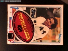 1981 TOPPS FOOTBALL CELLO PACK, CARDS SHOWING #429 AND #384
