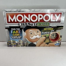 Monopoly Crooked Cash Board Game Ages 8 and Up