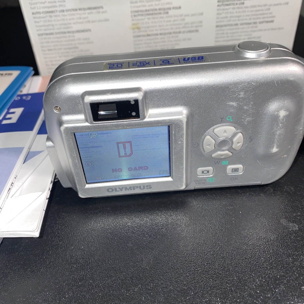 Olympus Camera D-390 2.0MP Compact Digital Camera & Paperwork