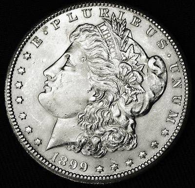 1899-o Morgan Silver Dollar.   Full Chest Feathers.    BU (Inventory A)