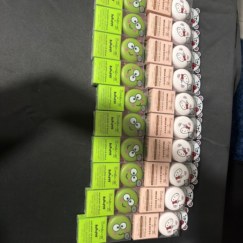 20 **NEW * The Creme Shop *  Hello kitty And Other Macaron Lip Balms