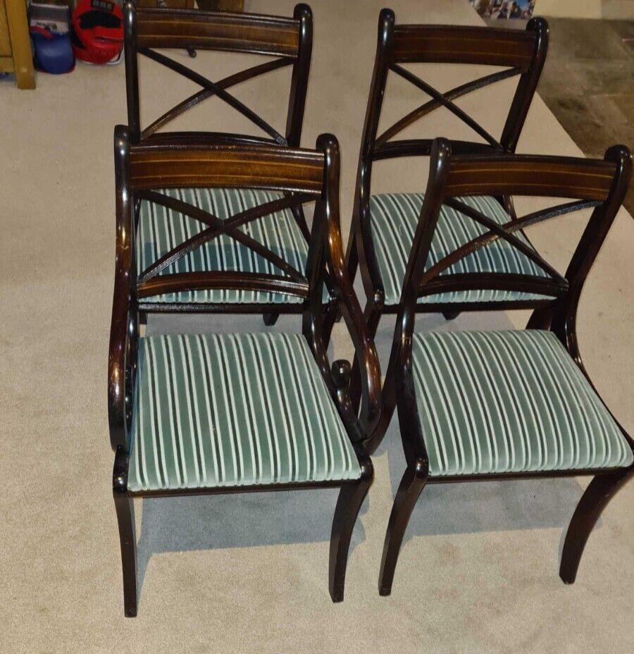 Five dark wood chairs with stripy attached cushions 2 have arms, 3 do