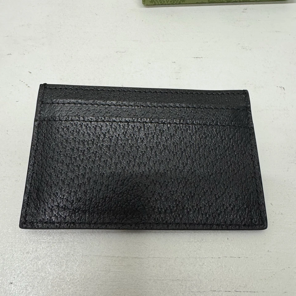 Tarjetero Gucci GG Marmont en dorado/negro Foto 3 de 4