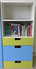 IKEA Stuva shelving unit with blue and green drawers