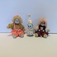 Charming Small Porcelain Face Clowns, Weighte...