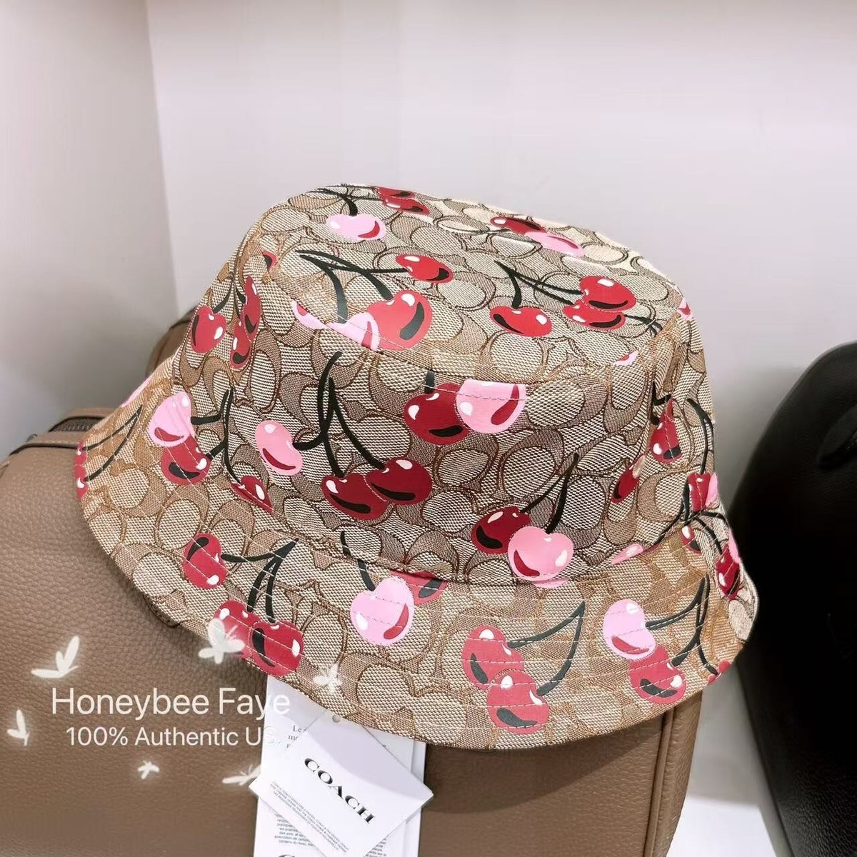 【COACH】チェリープリント＊ バケット ハット CZ550 NWT Coach women's Signature Cherry Swirl Print Bucket Hat