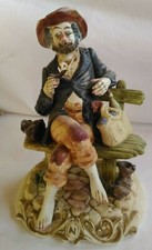 Scultura statua soprammobile capodimonte ceramica dipinta vagabondo clochard