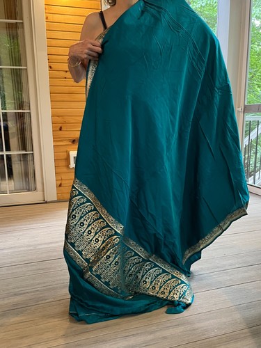 Beautiful teel silk sari with gold embroidery