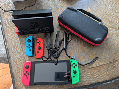 Nintendo Switch Bundle Console, Case, Charger, Controllers