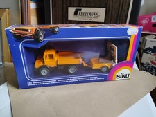Kastenmodell Siku 2215 Mercedes Unimog mit Anhänger Fahrtrichtungsanzeiger Autobahn