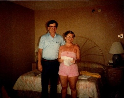 Vintage Found Photograph  Couple in Hotel Room with Letters in Hand 1988