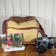 Canon AE-1 Program 35mm SLR Film Camera with 50 mm Lens Kit