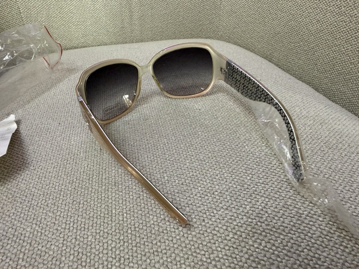 Coach April S444 oversized sunglasses featuring a pink 