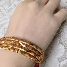 Elegant, Gold 4pc 1/8in W Etched Floral Design Child-Teens 7in C Bangle Bracelet