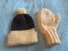 Handknitted child's stocking hat and mittens