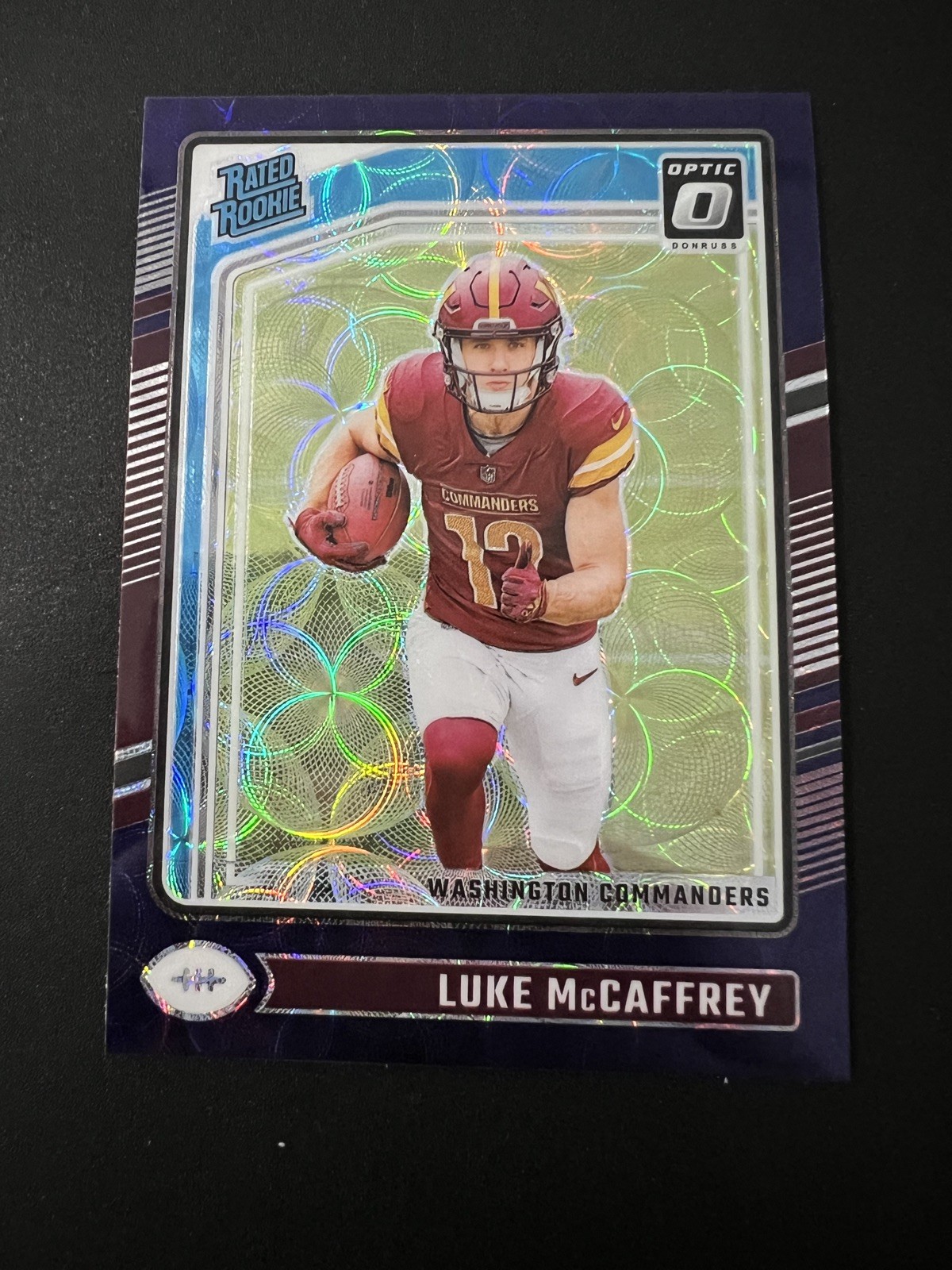 2024 Donruss Optic Luke McCaffrey Purple Scope Rated Rookie #268
