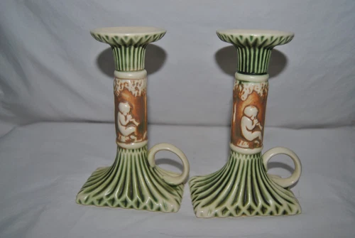 Roseville Donatello Cherubs Candles Sticks With Loop Handle Nice Dark Colors