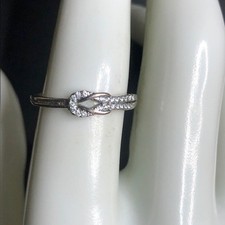 8745 Sterling Silver eternity Knot CZ band Ring Size 7 adjustable