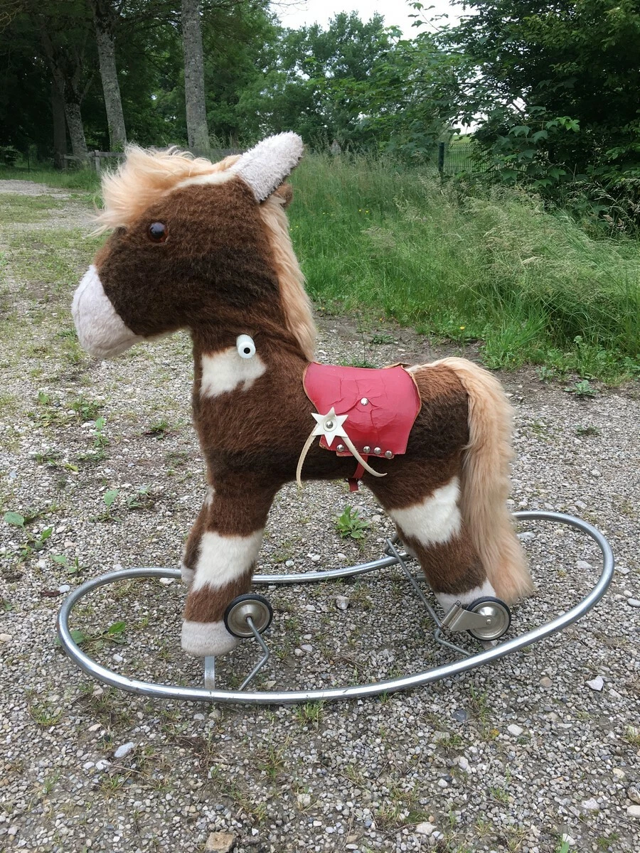Cheval à bascule et on sale à roulettes 2 en 1