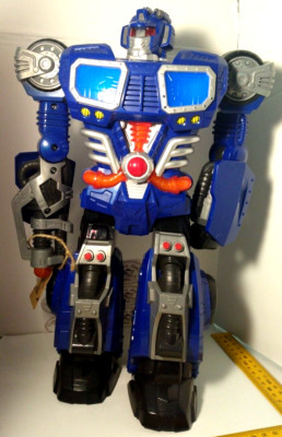 HAP- P -KID TOY GROUP LARGE WALKING LIGHT UP ROBOT, TRANSFORMER 14'' W/O SWORD
