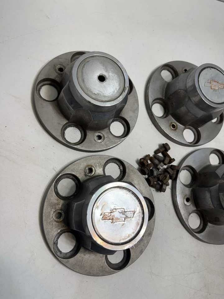 Tapacubos central de rueda Chevy C10 1974-1987 14018276 14018277 OEM Foto 2 de 4
