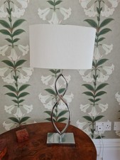 Dar Lighting modern chrome table lamp with cream oval shade