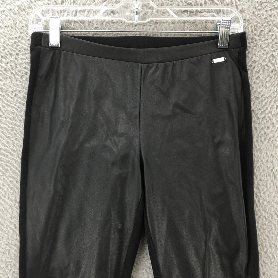 Leggings ajustados Guess para mujer pequeños negros tiro medio frente plano informales Foto 2 de 4