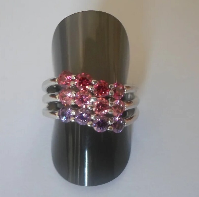 solid silver ring, openwork sides, trio of stones… - image 1