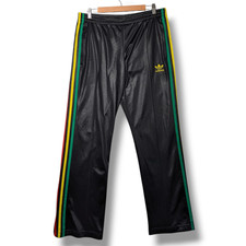 Pantaloni tuta Adidas Chile 62 Rasta Track uomo piccoli neri gamba larga fondo